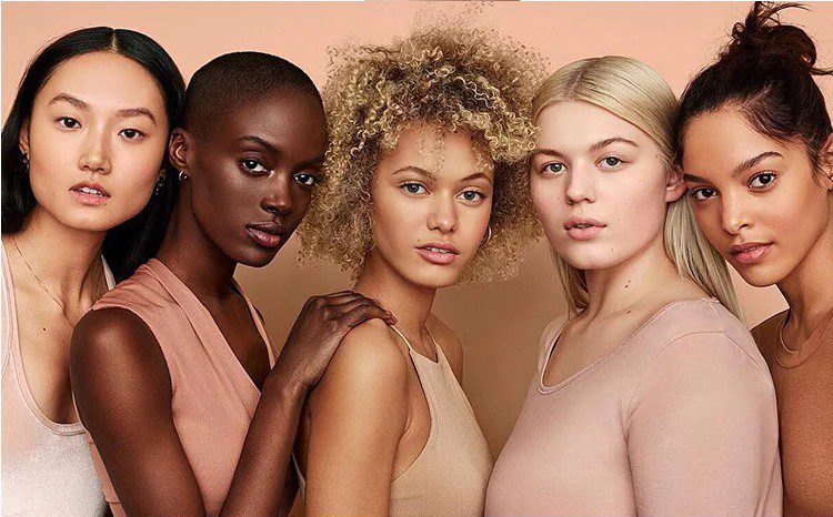 Portrait of 5 women with different skin types and colour